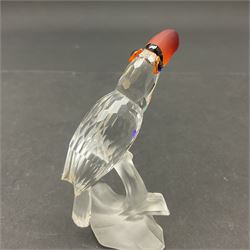 Three Swarovski Crystal bird figures, comprising Toucan, pair of puffins and pair of parrots on a branch, tallest H10cm