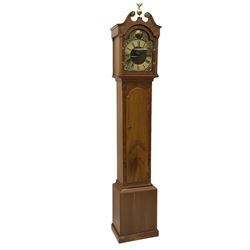 A bespoke handmade 20th century longcase clock in a slim Yew wood case with a German three train weight driven movement sounding the hours and quarters on 12 gong rods, with a brass break-arch dial, cast brass spandrels and an etched chapter ring, Roman numerals and minute track, dial engraved 'Parkinson Liner',  convex boss to the arch engraved 'Tempus Fugit', strike silent facility, With triple weights & Pendulum. 


