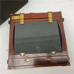 Folding plate camera in mahogany and lacquered brass, with Rapid Symmetrical Reetigmat len and two dark slides in canvas case