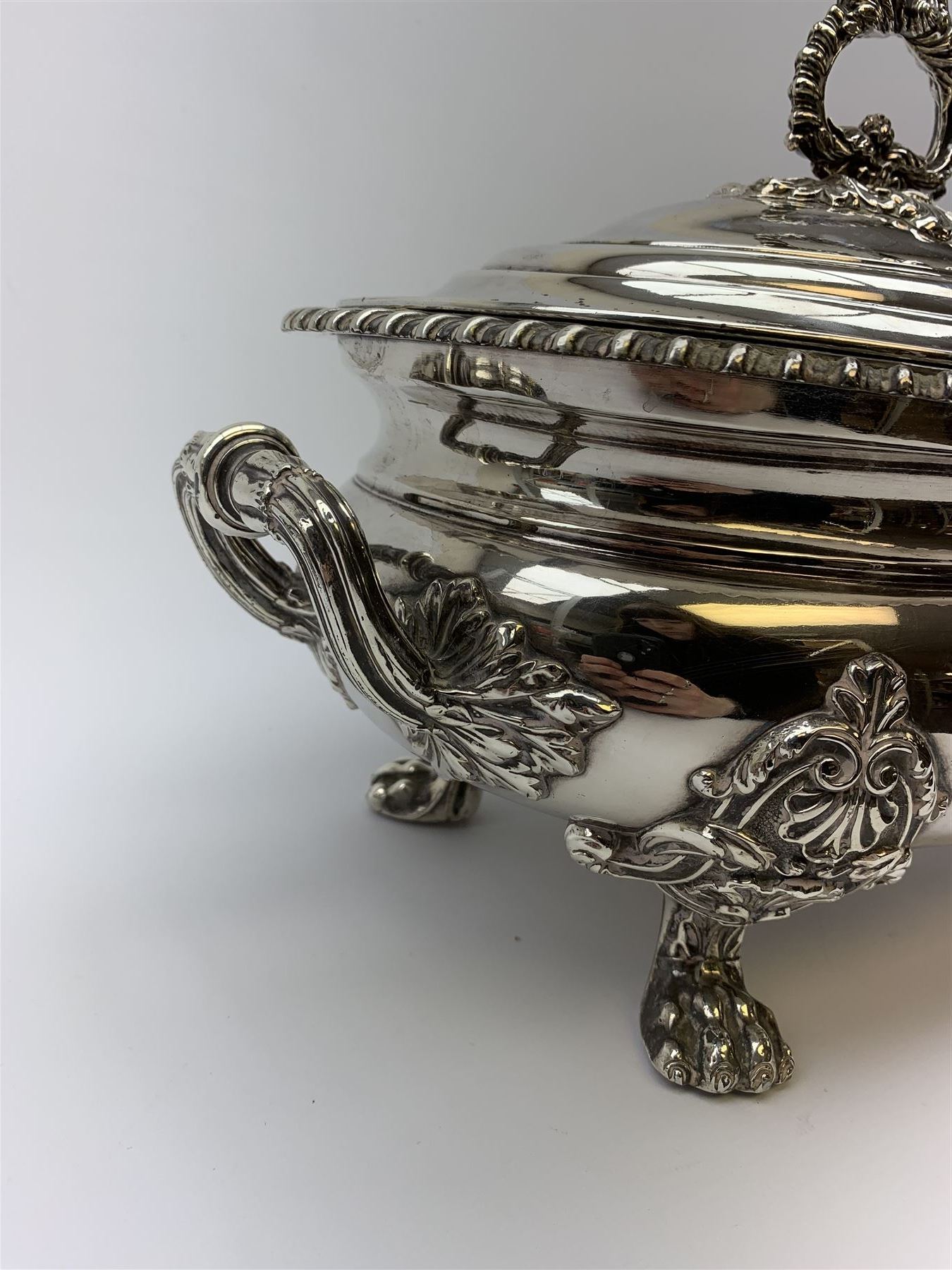 Matthew Boulton silver plated tureen and cover, the body of oval form with twin handles engraved with crest, probably for Whitgreave/Whitgrave family of Moseley Staffordshire, 'Regem Defendere Victum', (To defend the king even in his defeat/To defend the conquered king ), upon four paw feet, the cover with gadrooned rim and foliate loop handle 