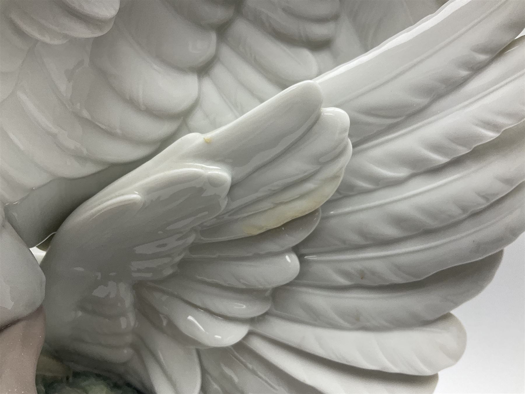 Large Lladro figure group, Swans Take Flight, modelled as two swans upon raised on circular wooden plinth, sculpted by Salvador Debon, H68cm