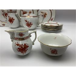 Herend Chinese Bouquet Rose pattern tea service comprising teapot, coffee pot, open sucrier, six cups and saucers, six tea plates, cream jug and stand, milk jug, two teabag holders, preserve pot, two leaf shaped dishes, four egg cups, salt & pepper pots, pair side plates and another plate
