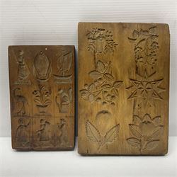 Two wooden biscuit moulds, carved loving spoon and fork, and two bradawls 