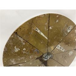 Circular limestone table top, with orthoceras and goniatite inclusions; age: Upper Devonian, location: Morocco, D45cm