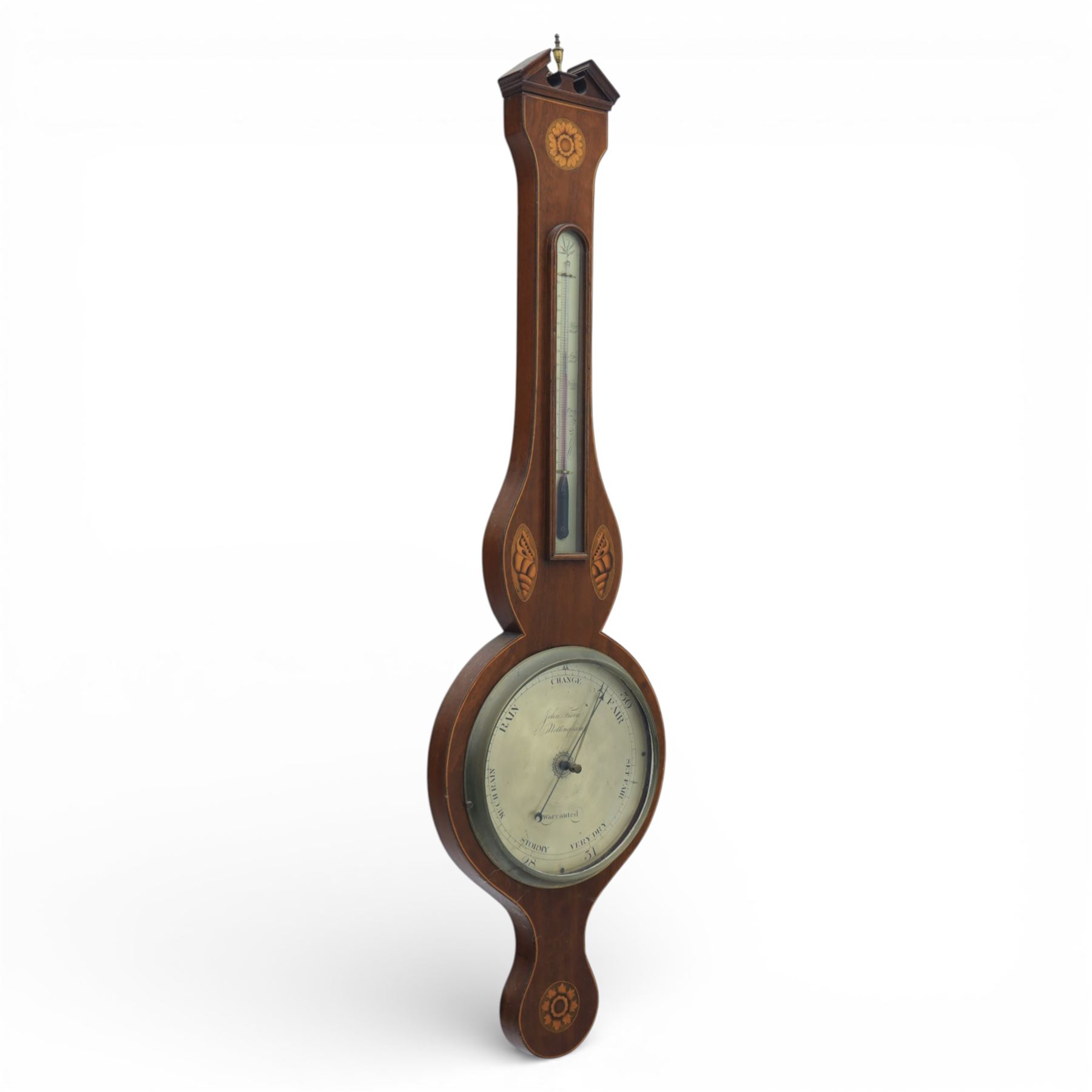 John Fiora- Nottingham, George III mahogany and inlaid wheel barometer, with a circular silvered brass dial, and spirit thermometer, shaped case with swan neck pediment surmounted by a brass finial, shell and floral paterae inlay, and boxwood stringing, U-shaped glass tube damaged/incomplete 