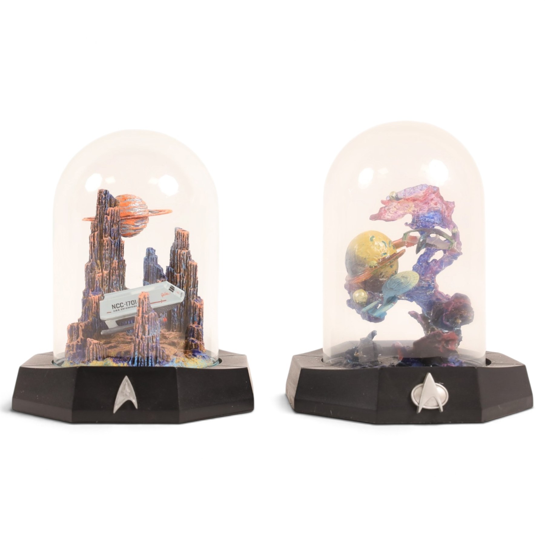 Franklin Mint limited edition Star Trek collectables, comprising seven miniature dioramas under display domes, The USS Enterprise Bold New Millennium large collectors plate, Crystal Edition Galaxy collectors plate and a talking series collectors plate
