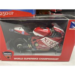 Nine NewRay 1:12 scale die-cast models of motorcycles including Ducati, Honda etc; and four other 1:12 scale die-cast models of motorcycles; all boxed (13)