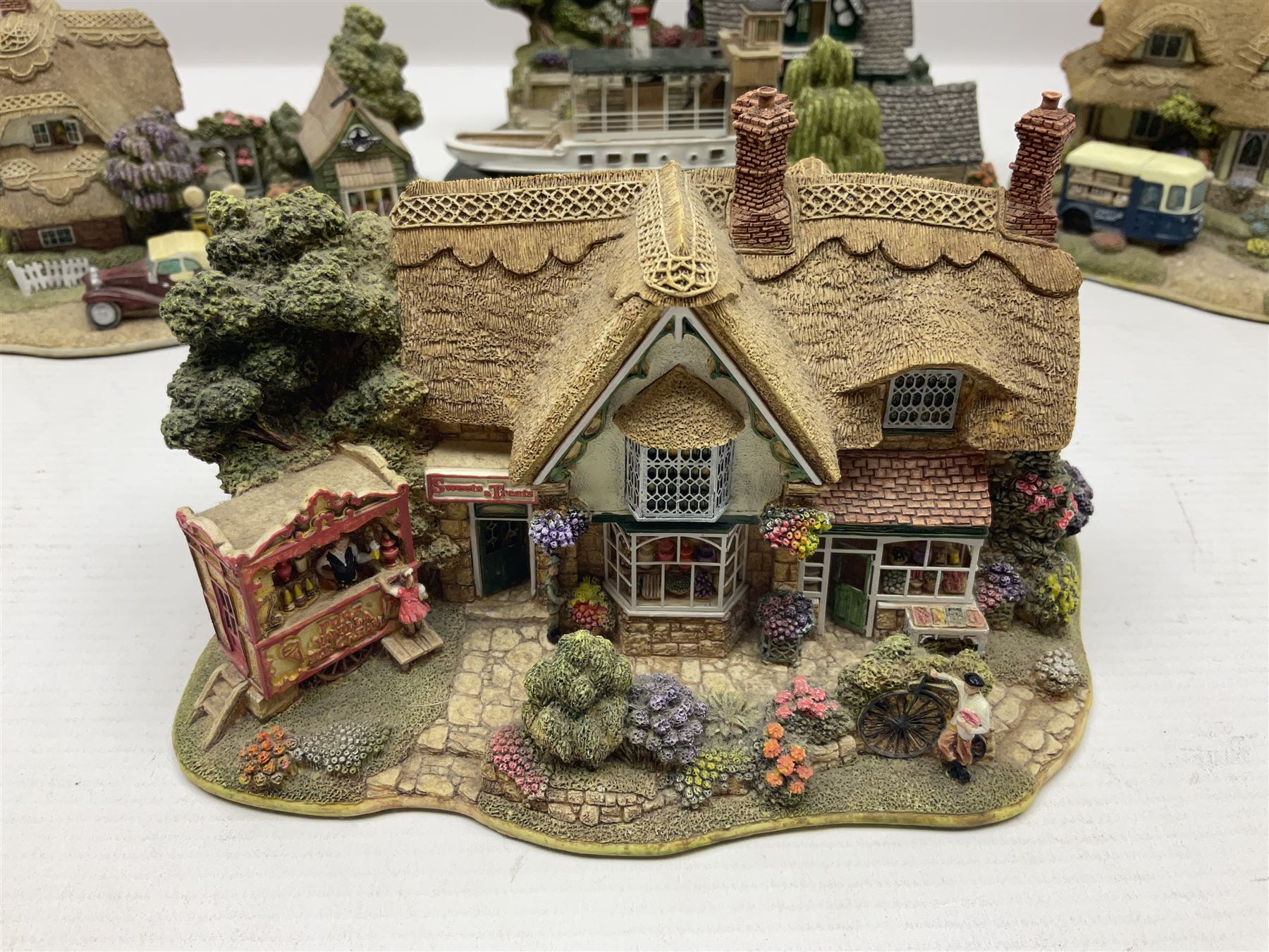 Five Lilliput lanes, comprising Queen of Windermere, Pen Pals, Two Pints Please, Burley Street and Sweets & Treats, all in original boxes  