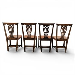 Set of eight George III dining chairs with padded seats, pierced vasiform splat, upholstered seat with brass trim, on square supports with H-stretcher