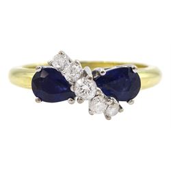 18ct gold sapphire and diamond ring, two pear shaped sapphires, spaced by five round brilliant cut diamonds, London 2008