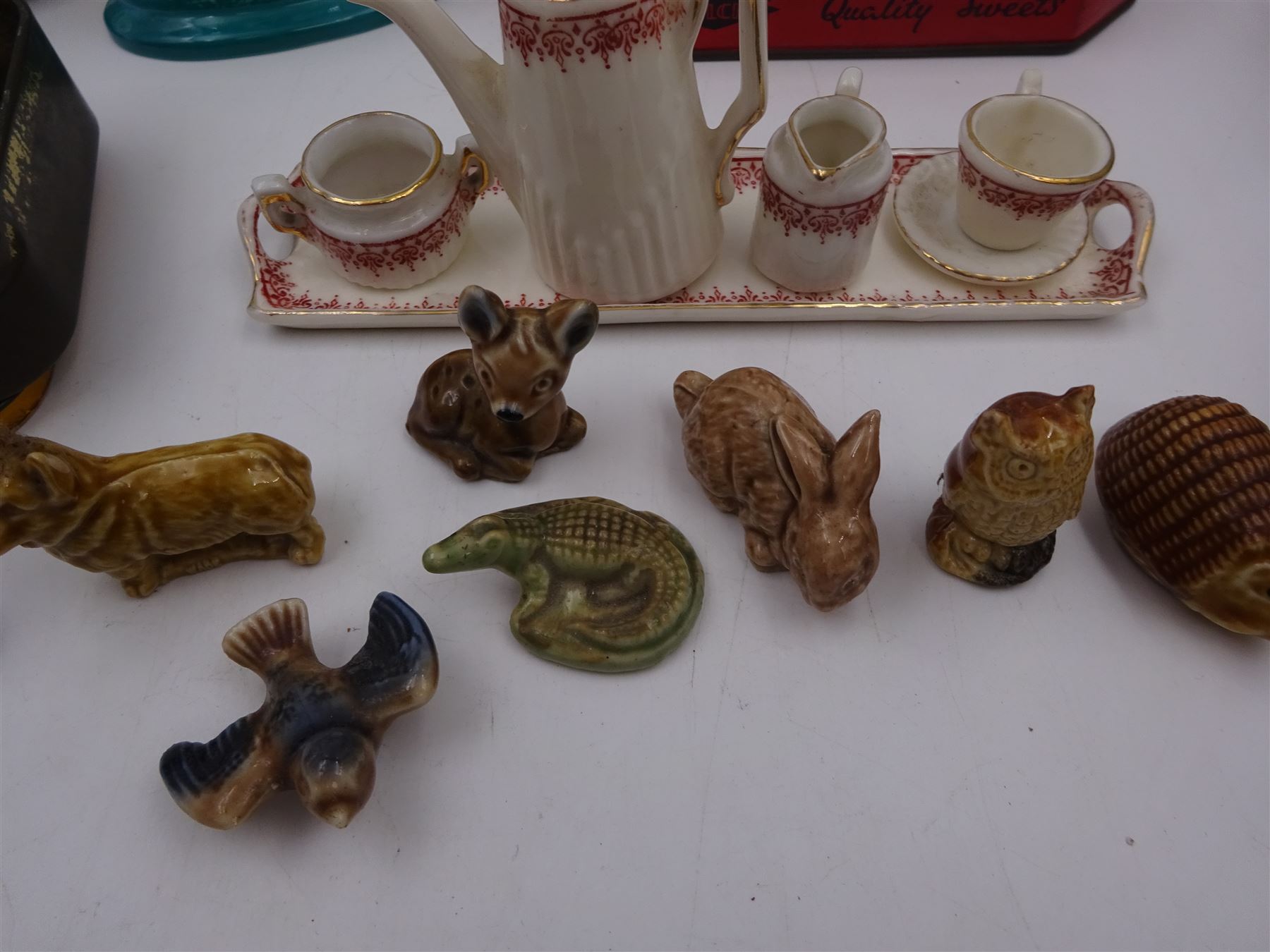 Minton table lighter decorated with a leaping salmon, signed T.Lee, with Ronson lighter mechanism, boxed, together with a Ronson Varaflame lighter, Stratton compact mirror, collection of Wade whimsies and a miniature Gemma teaset