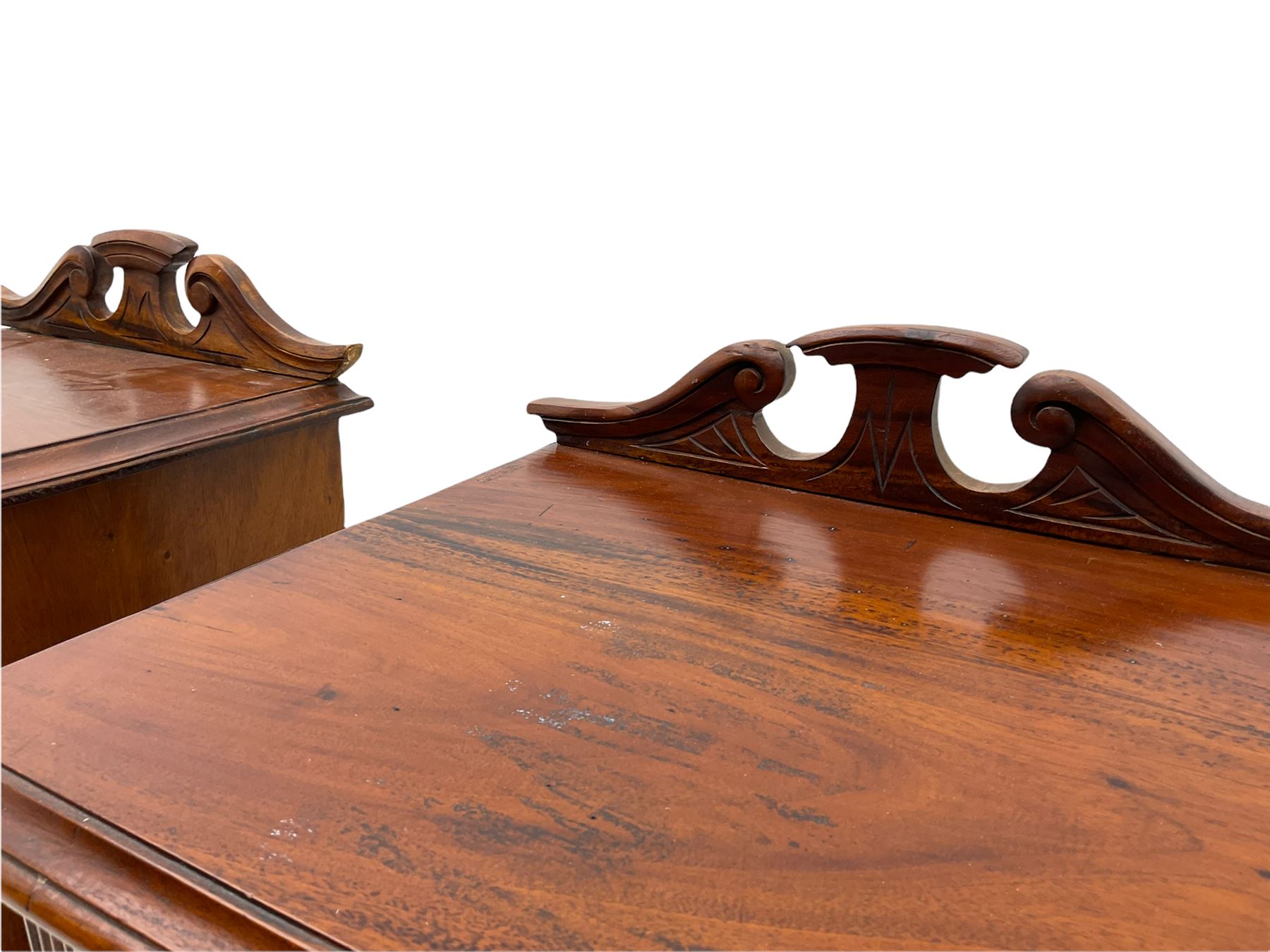 Pair Victorian style hardwood bedside cabinets, fitted with single drawer and cupboard, the doors carved with floral urns, on plinth bases