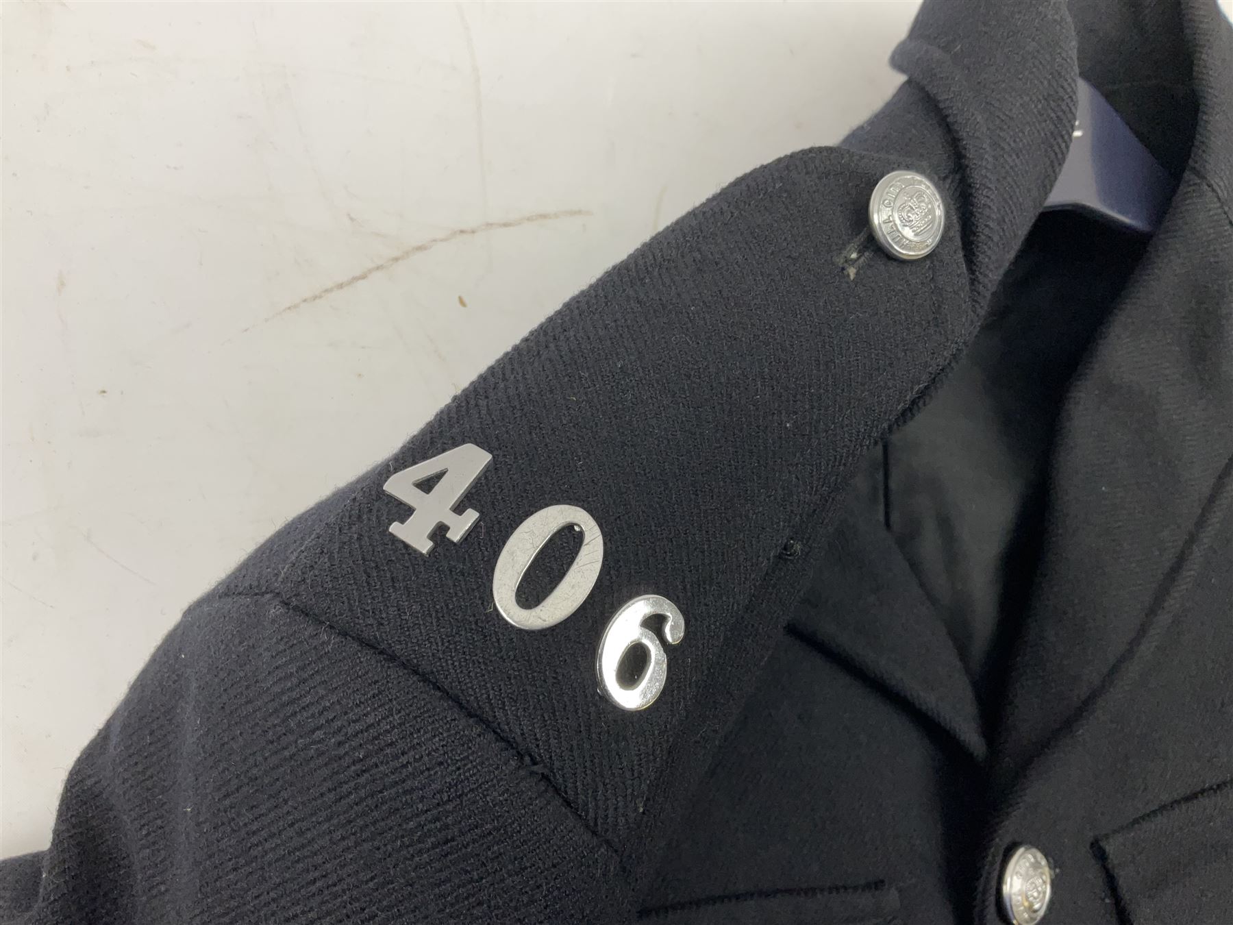 Hull City Police - vintage tunic with matching cape, collar no.H460; another tunic with WW2 medal ribbon bar; early sergeant's tunic; and later sergeant's tunic (5)