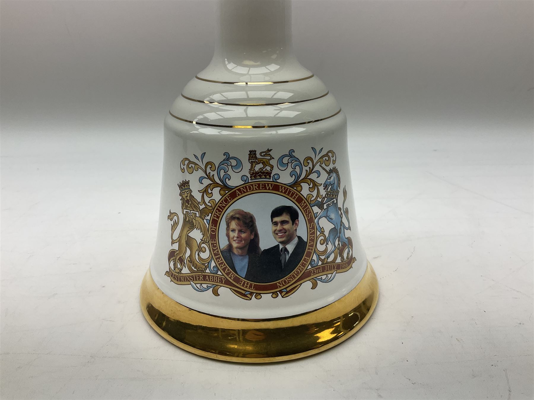 The Glenturret malt liqueur, 70cl, 35%vol and a Bell's Scotch Whisky decanter commemorating The marriage of Prince Andrew with Miss Sarah Ferguson 23rd July 1986, 75cl (2)