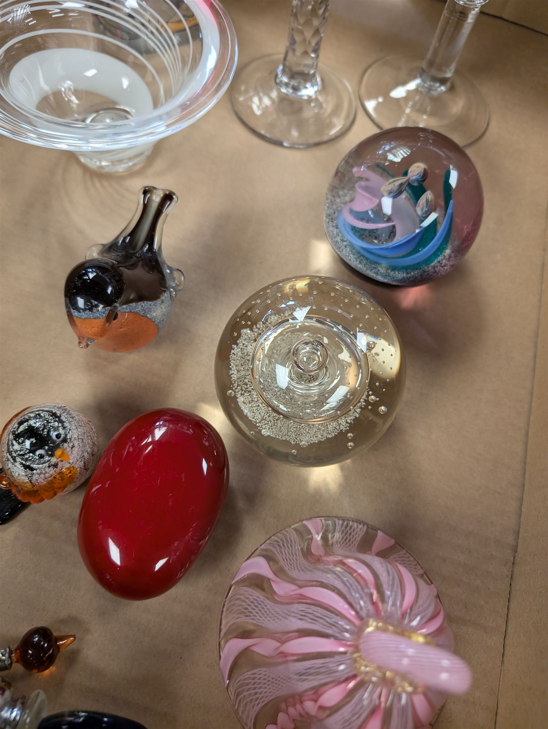Collection of glassware, including two Caithness paperweights, Langham robin paperweight, Murano bell, etc