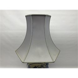 Chinese blue and white table lamp of baluster form, decorated with birds and floral displays, on hardwood base with shade, H78cm