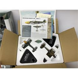 Fourteen die-cast models of aircraft including four Oxford Aviation, two Military Giants of the Sky, two Ixo Models, Corgi Warbirds Messerschmitt, Atlas Editions Spitfire and Messerschmitt, two Hobby Master etc; and two die-cast models of tanks; all boxed (16)