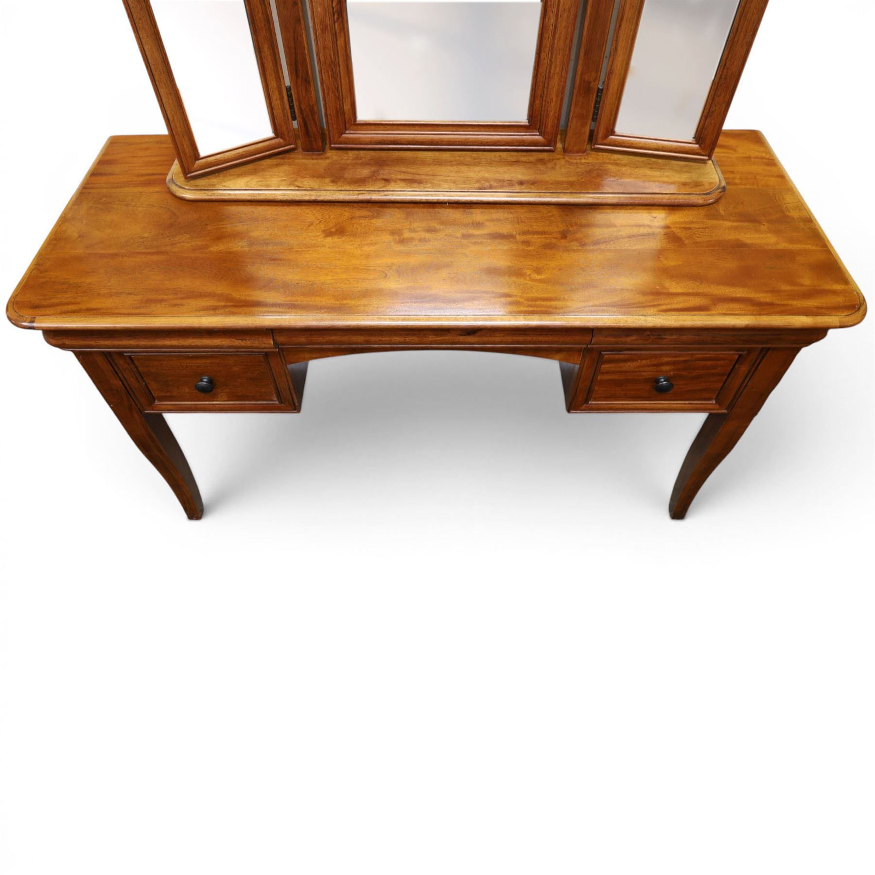 Willis & Gambier - mahogany dressing table, three part mirror and stool, the dressing table with rectangular top with chamfered corners, over two baize lined frieze drawers, kneehole recess and a single drawer either side, three part mirror with central tilting mirror on a moulded plinth base, with oval beige padded stool 