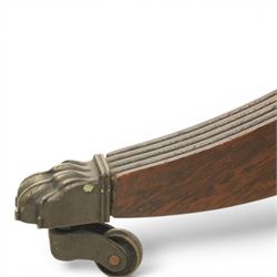 Pair of Georgian design flame mahogany wine tables, circular book-matched veneered tops with moulded edges, on turned pedestals and four reeded downswept supports terminating in brass caps and castors