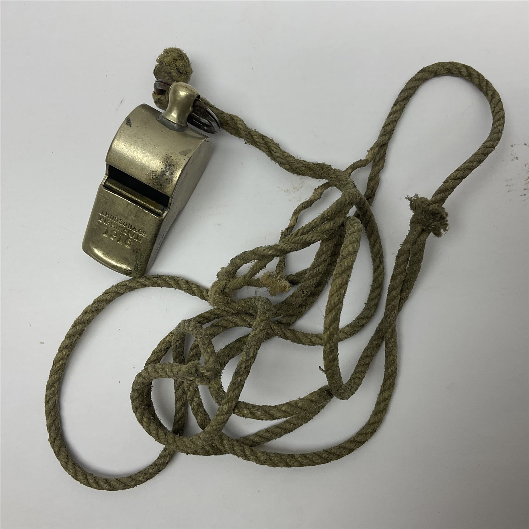 WWI J. Hudson & Co. Birmingham trench whistle dated 1916; WWI British War Medal awarded to 117363 Gnr. N.L. Wright R.A.; Services Rendered badge No.111643; RAF & RFC cap badges etc