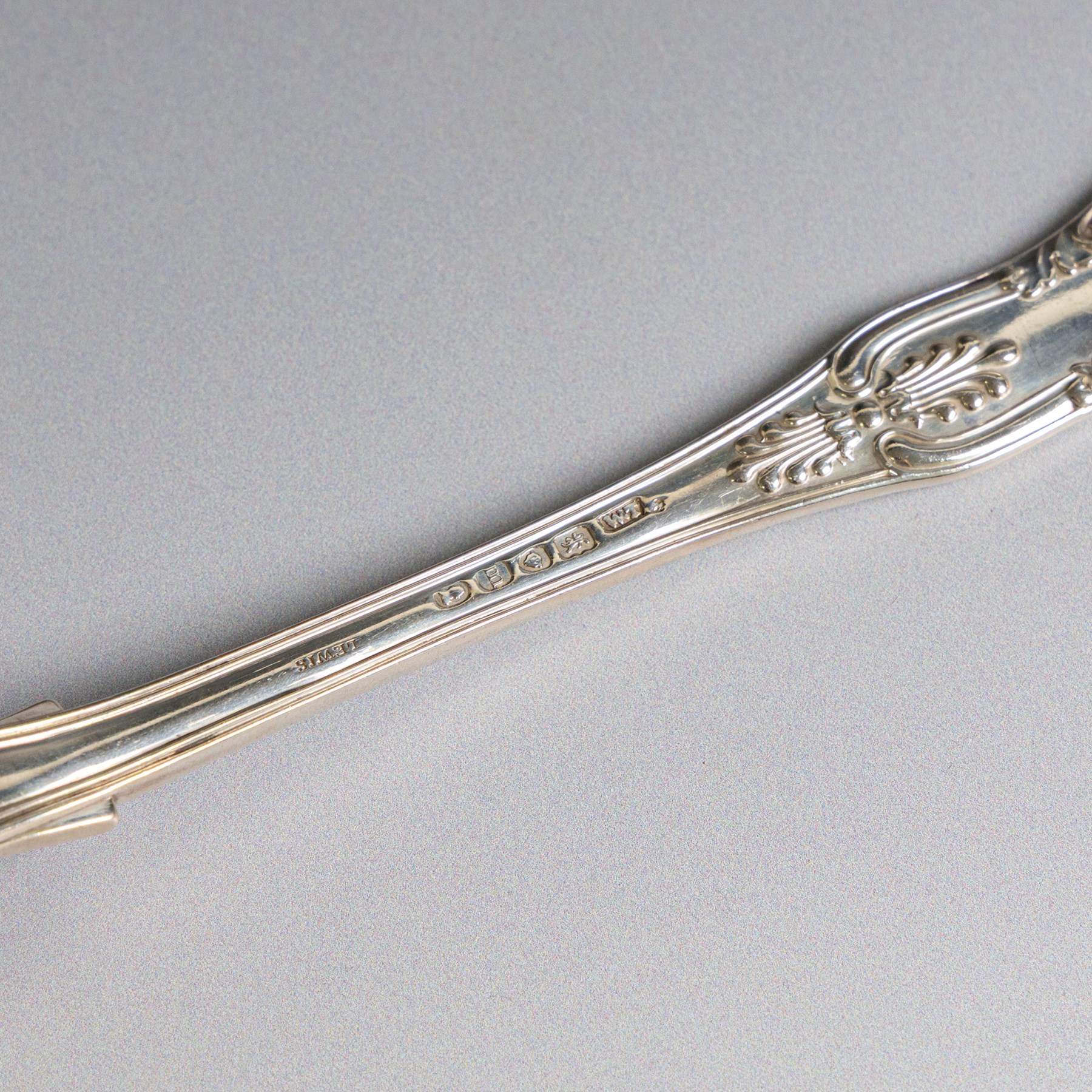 Four silver Kings pattern table spoons, comprising George IV pair, engraved with stork and serpent crest, hallmarked William M Traies, London 1827 and a Victorian pair, hallmarked Mary Chawner, London 1838