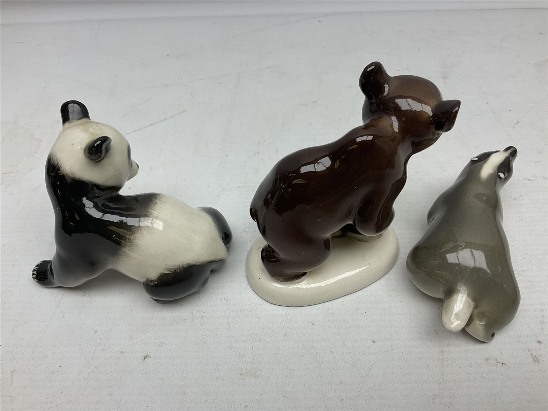Collection of Russian Lomonosov USSR animal figures, to include  lynx, tiger, red panda, sealion, panada, etc 