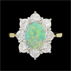 18ct gold opal and round brilliant cut diamond cluster ring, London 1976, opal approx 0.75 carat, total diamond weight approx 1.00 carat