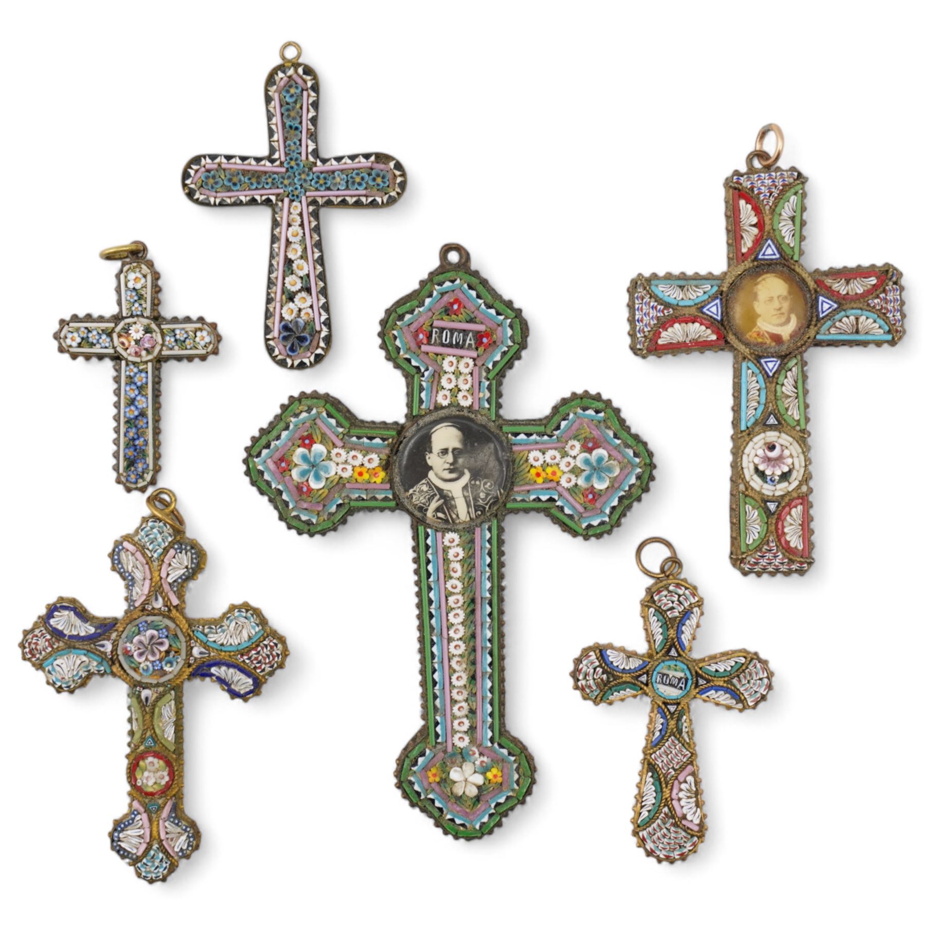 Set of six Italian micro mosaic cross pendants, each decorated with repeating floral patterns, two with central panels depicting Pope Pius XI, largest H10cm