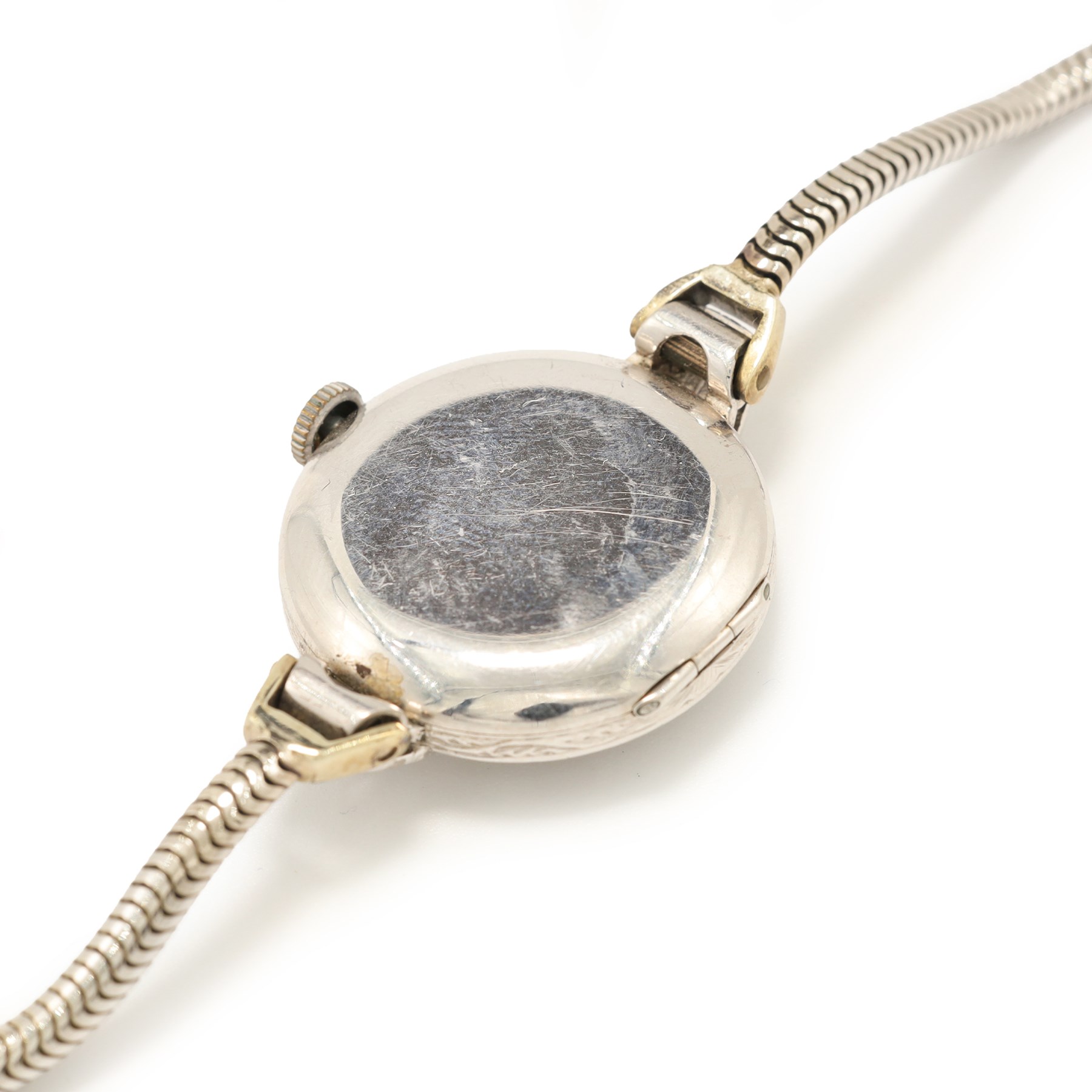 Vertex Supreme ladies platinum and 9ct white gold diamond manual wind wristwatch, silvered / white dial with Arabic hour markers, the bezel set with thirty-two round brilliant cut diamonds, stamped Platinum, on a white gold snake bracelet, Birmingham 1967, total diamond weight approx 1.60 carat