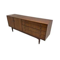 Mid-20th century teak sideboard, fitted with double cupboard and four drawers
