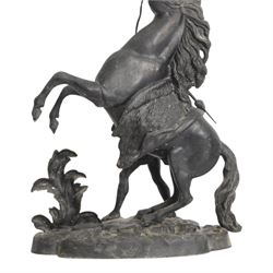 Three spelter Marley Horse figures, after Guillaume Coustou, each modelled as a rearing horse restrained by  groom, tallest H41cm