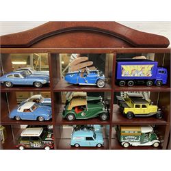 Collection of die-cast vehicles to include Corgi, Dinky, Lledo and Days Gone, housed in six wood display units