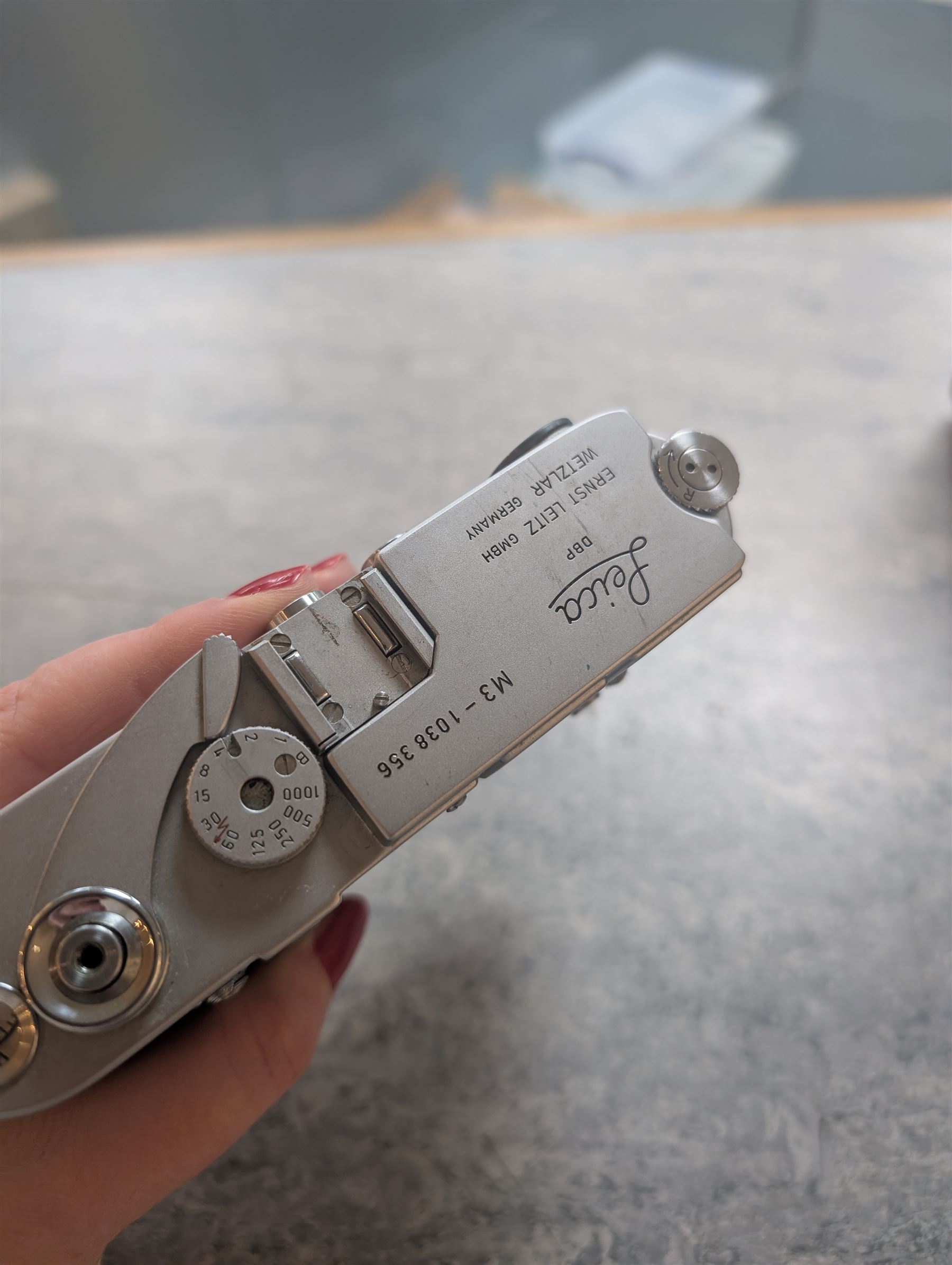 Leica DBP M3 35mm rangefinder camera body, serial no. 1038356, circa 1961, in chrome finish, housed in brown leather Leica case, with a Leitz Wetzlar Sunnilux 1:1.4/50 lens serial no. 1845148, Leitz Wetzlar Elmar 1:4/135 lens serial no. 1825980, 12575N hood, 12521G hood, Leica Meter MC serial no. 99015, Sunpak Auto28 SR Thyristor, Linhof 3 Way Pan tripod, and a Toshiba PE-1 Linear Exposure meter, all housed in an Original Benser Everready Case, most items with instruction booklets 