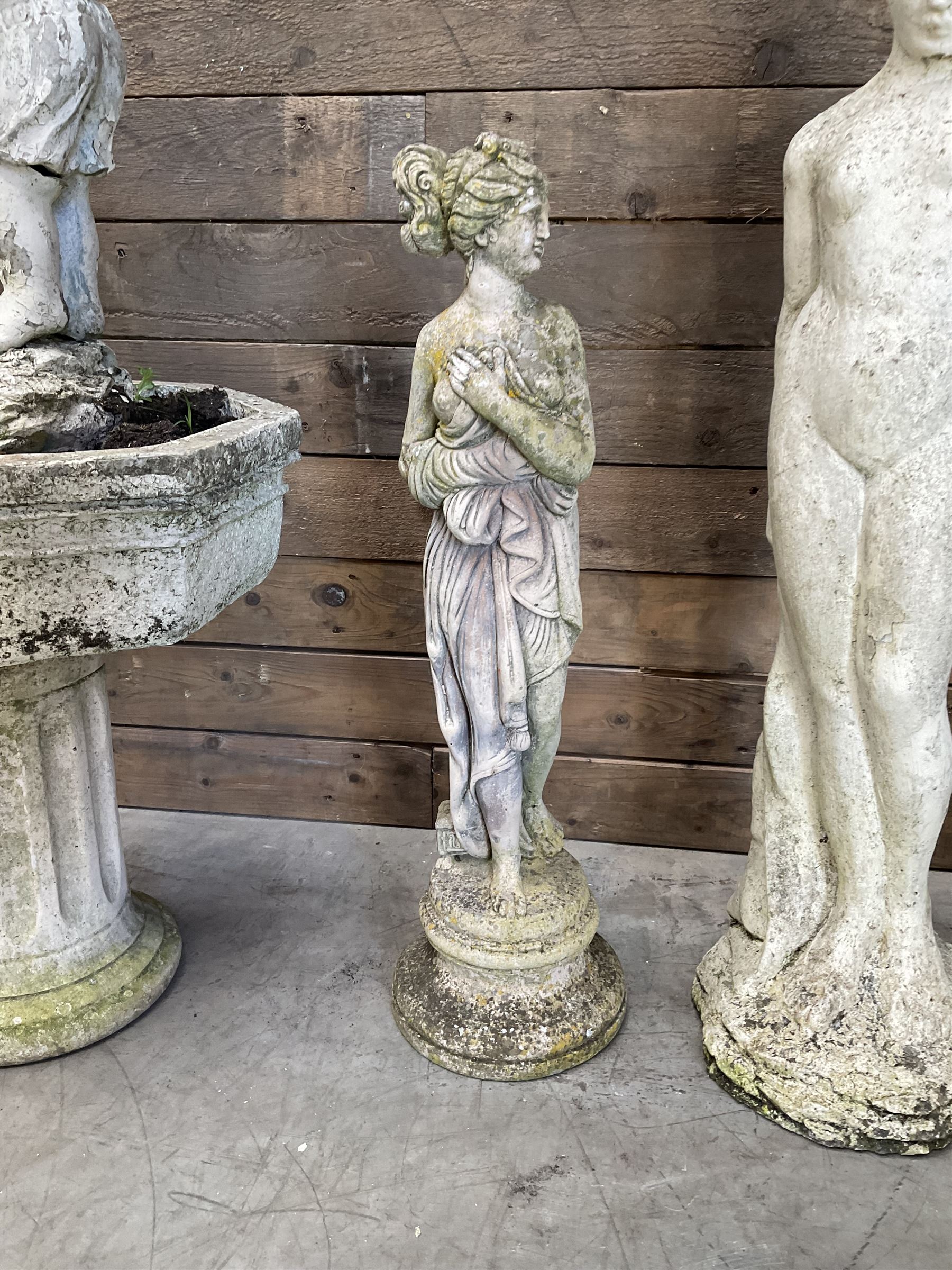 Four cast stone maiden figures, small bird bath and planter