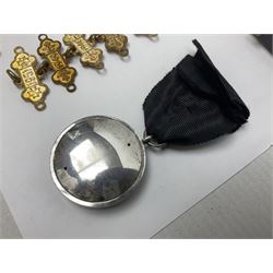 Four St John's silver fobs, together with two silver Directors Ambulance shield fobs and two other St Johns items 