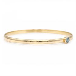 18ct gold fancy blue diamond bangle, bezel set with a single round brilliant cut diamond of approx 0.35 carat, stamped 750