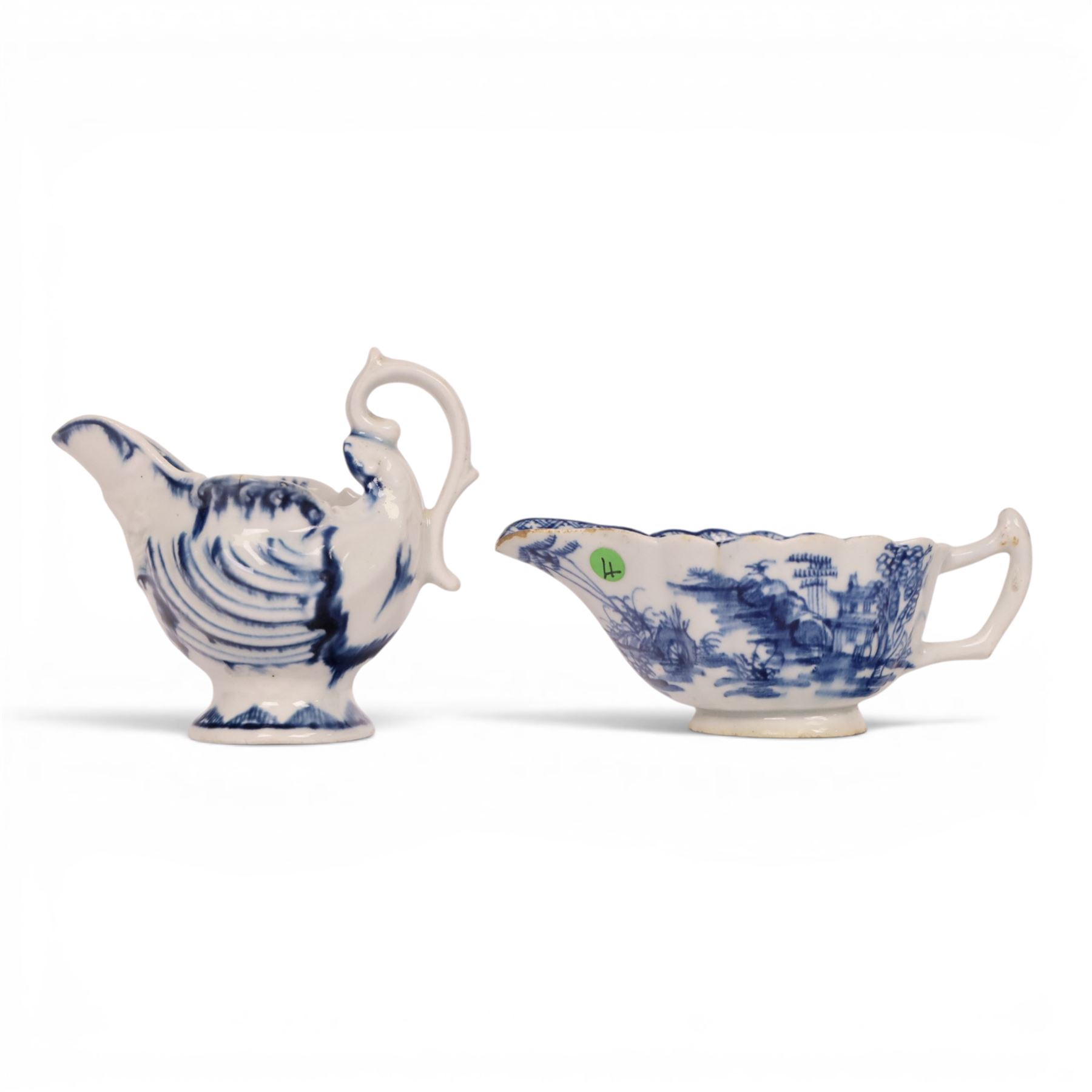 Derby blue and white dolphin ewer cream boat, circa 17750, H8cm, together with a Bow blue and white cream boat, decorated in the Desirable Residence pattern, circa 1760, L11.5cm
