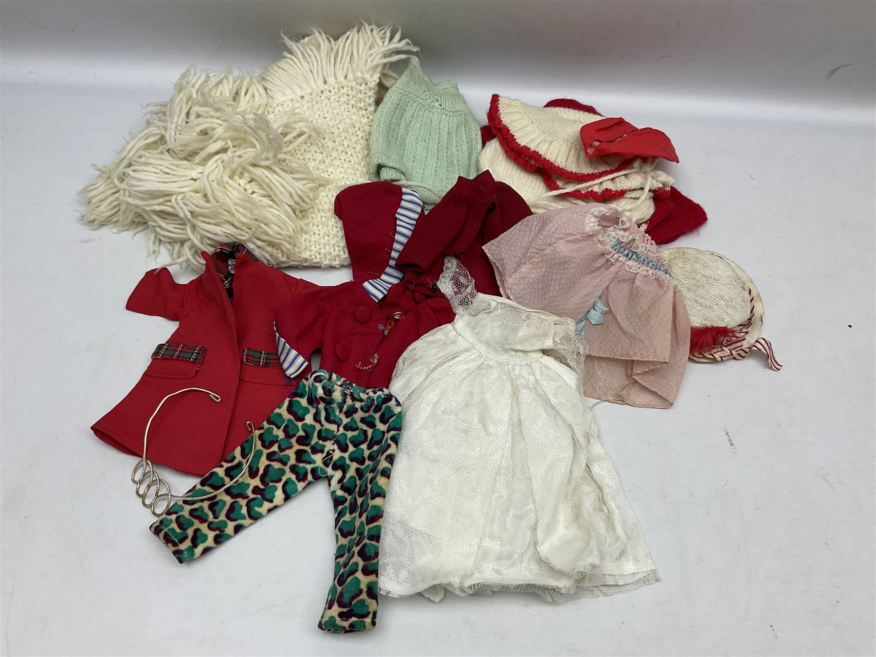 1960s Pedigree hard plastic walking doll H41cm; two fashion dolls; quantity of doll's clothing by Faerie Glen, Pedigree etc; and small collection of National Costume dolls; together with Dinky die-case army truck