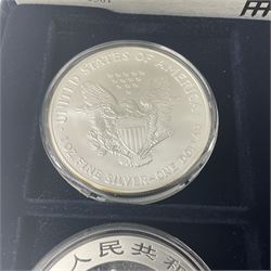 Four one ounce fine silver coins, forming 'The 2007 Famous World Silver Coin Collection', comprising United States eagle, Australian kookaburra, Chinese panda and Canadian maple leaf, cased with Westminster certificate 