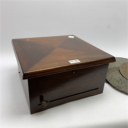  German Schutz-Marke Symphonium disc musical box in later mahogany case, the quarter veneered top opening to reveal the Symphonion label behind glass under the lid, twin steel combs with forty-two teeth each and lever winding action to the front No.350480, with six 27cm discs, 35.5cm square  