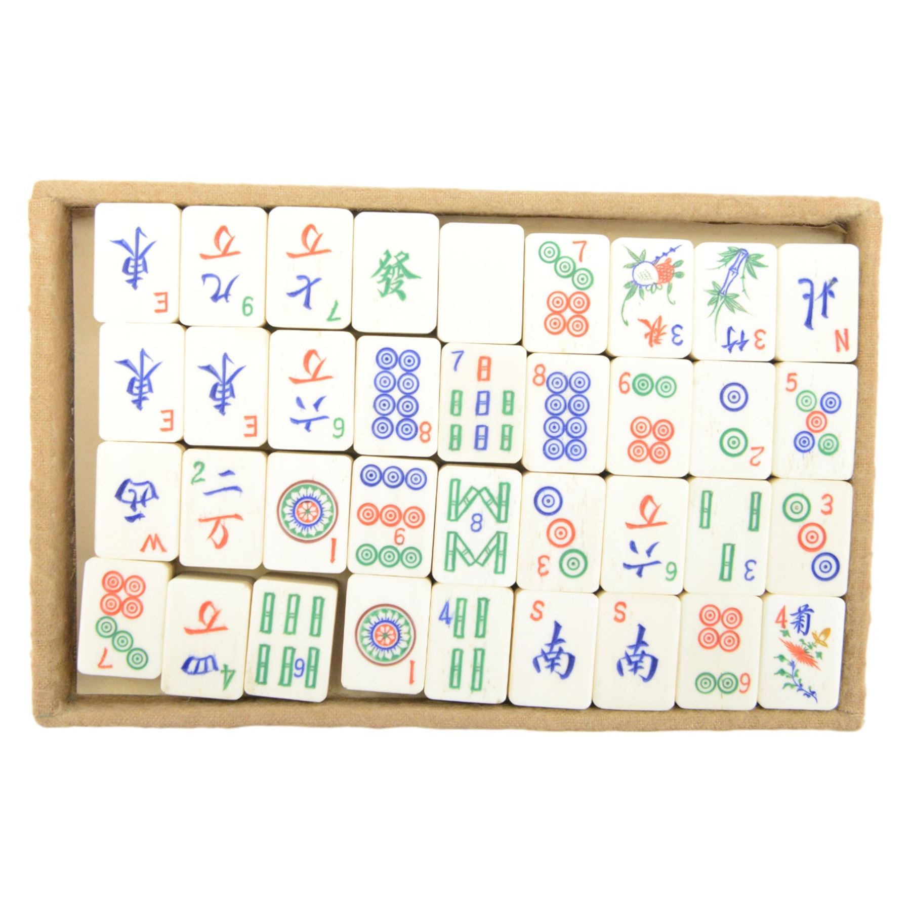 20th century Chinese Mahjong set, with five trays containing bone counters and tiles, contained within a leather bound travelling case with embossed detailing