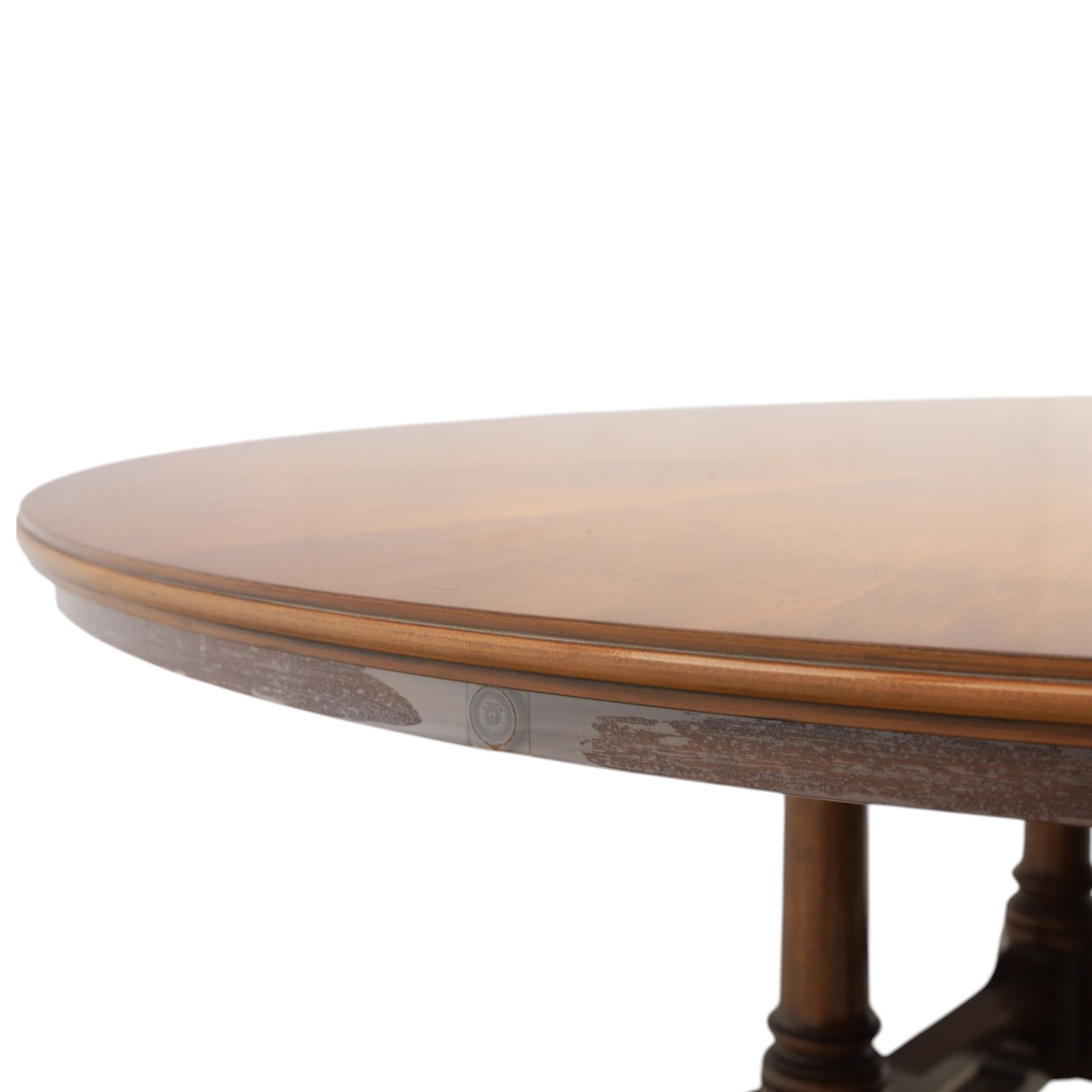 Bevan Funnell Reprodux - Regency design mahogany extending dining table, circular radial veneered top with central fan inlaid patera, on turned pedestal with four reeded downswept supports terminating in brass caps and castors, with six addtional leaves in a fitted storage case