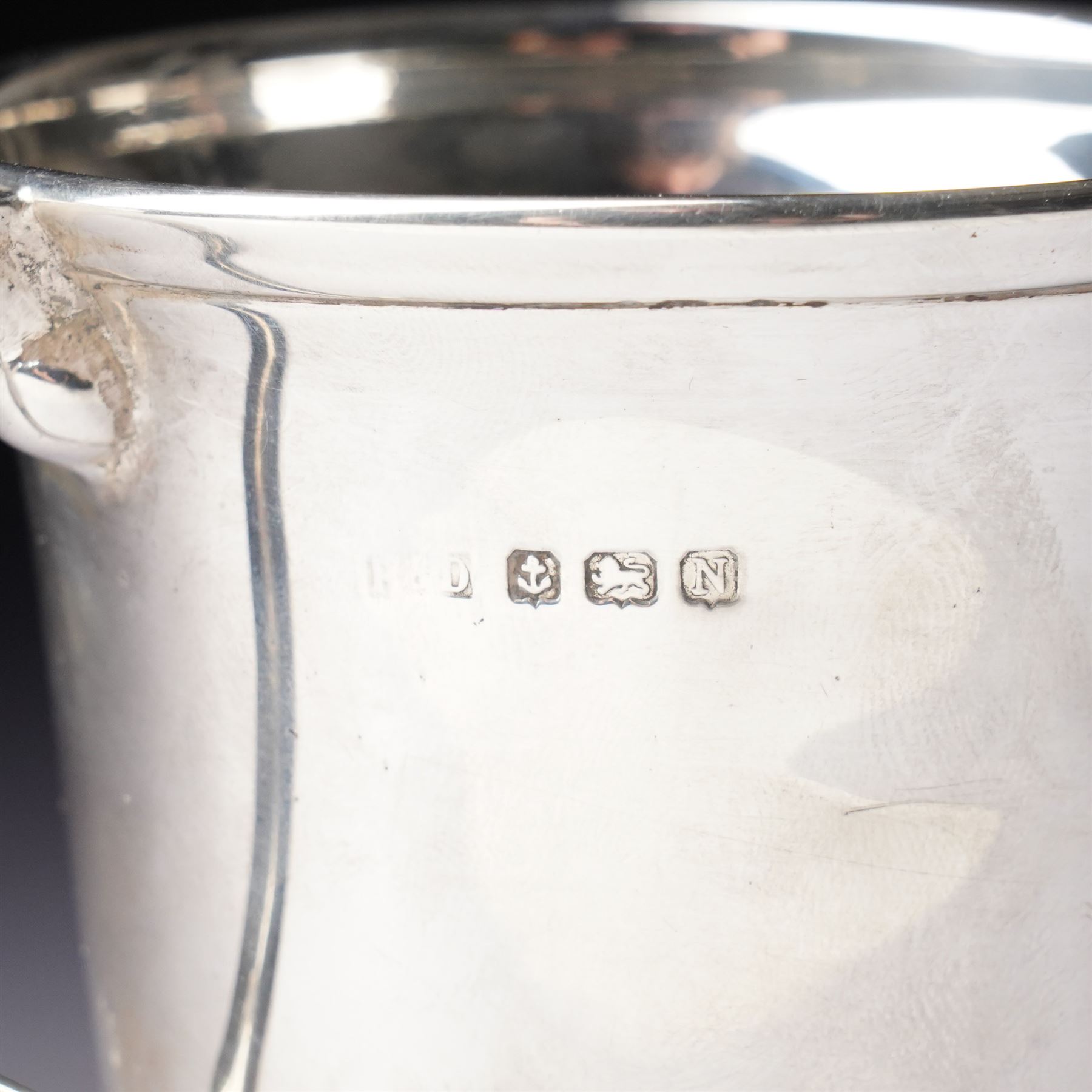 Silver christening mug  with loop handle engraved with initials H8cm Birmingham 1937 Maker possibly Roberts & Dore