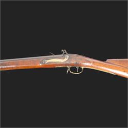 Brown Bess flintlock musket, 37in barrel, action marked with crowned GR and Tower, with brass mounts, the thinned butt marked 38, sling swivels, steel ramrod, overall L132cm
