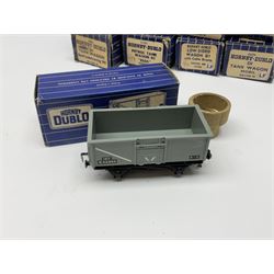 Hornby Dublo - twenty wagons including Cattle Truck; Low-Sided Wagons; Cable Drum Wagon; Tank Wagons for Shell Lubricating Oil, Esso and Mobil; Mineral Wagon; 20-Ton Bulk Grain Wagon; Goods Brake Van; Coal and Sand Wagons; Ventilated Van; Bogie Bolster Wagon; High Capacity Wagon etc; all in blue striped boxes (20)