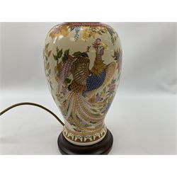 Table lamp of baluster form, decorated in the Oriental style with phoenix and dragon amidst blossoming flowers, with plated cream fabric shade, lamp base not including fixtures H35cm