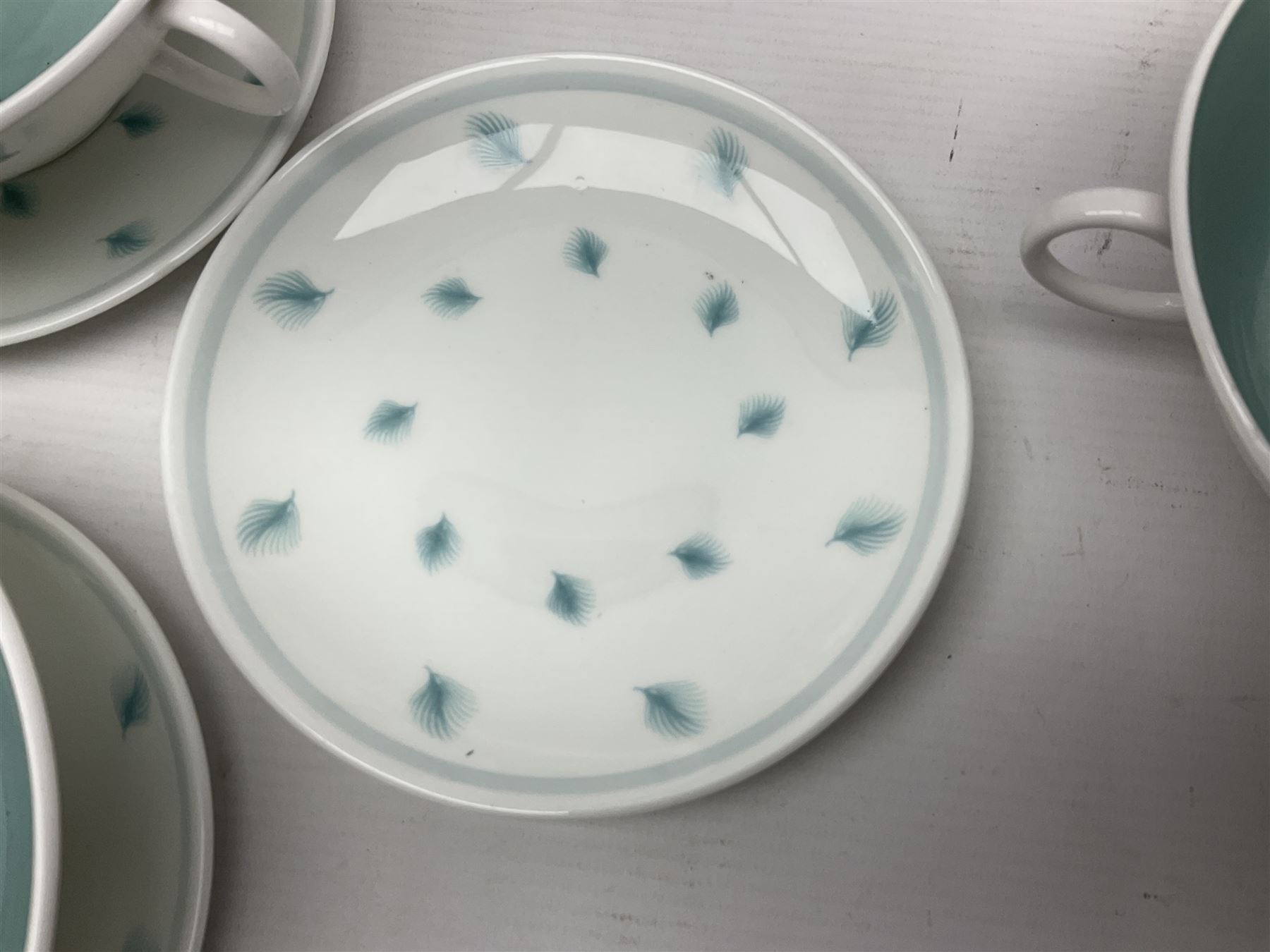 Susie Cooper Whispering Grass pattern dinner wares, to include tureen with cover, six twin handled soup bowls, dinner plates and side plates, etc 