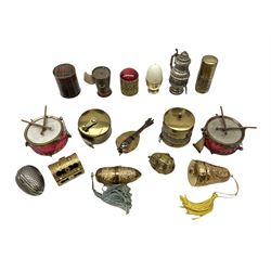 Collection of sewing accessories, to include tape measures, two in the form of drums, one in the form of mandolin, thimble holders with examples in the form of a chest, egg shaped etc  