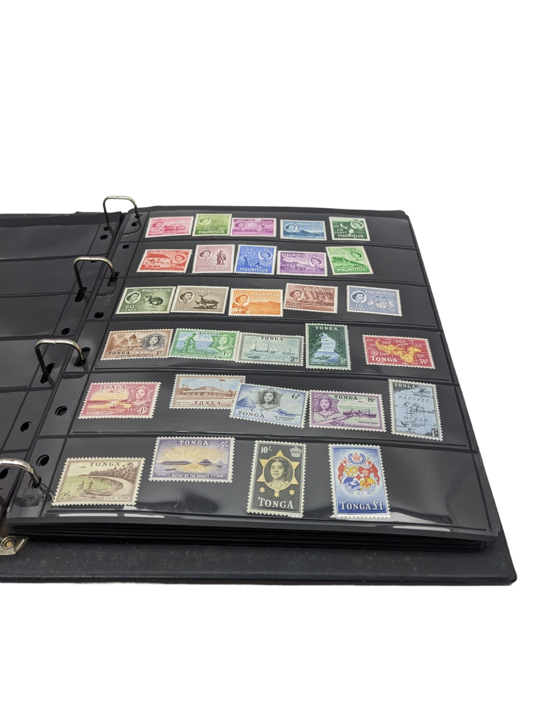 Mostly King George VI and Queen Elizabeth II Commonwealth or Empire stamps, including QEII British Solomon Islands, Pitcairn Islands, Seychelles, Sierra Leone, Mauritius, Guernsey etc, KGVI Turks and Caicos Islands, Falkland Islands Dependencies etc, mixture of mint and used values with some higher values