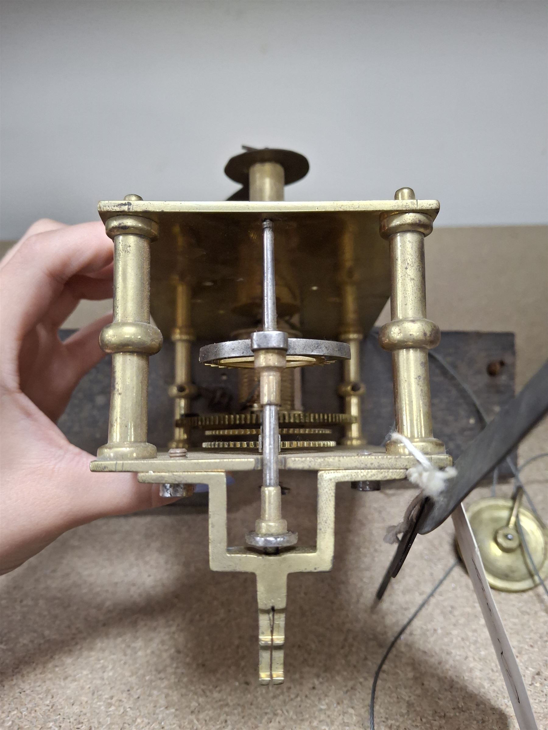 Two skeleton clock movements, tavern clock movement, and further clock movements, all for restoration 